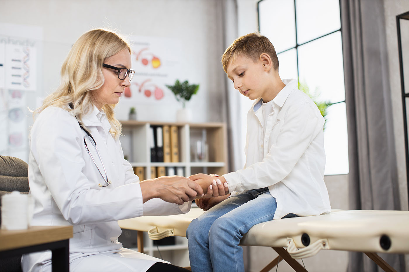 Teenage boy having medical consultation with doctor